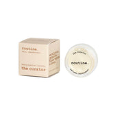 routine The Curator natural deodorant mini - closed glass jar with clear lid showing baking soda-free sensitive skin formula details